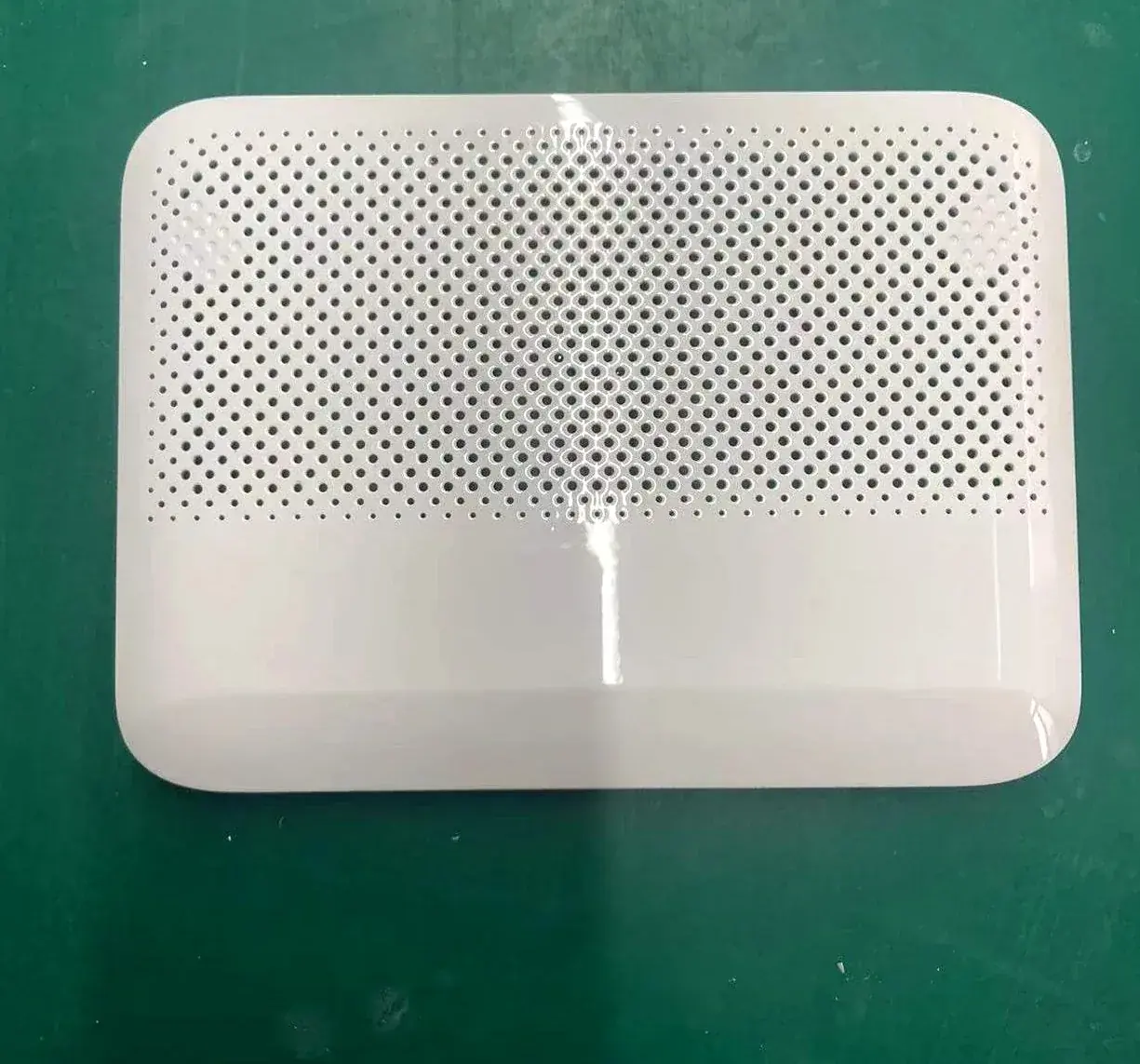 Perforated enclosure front cover, painted glossy white